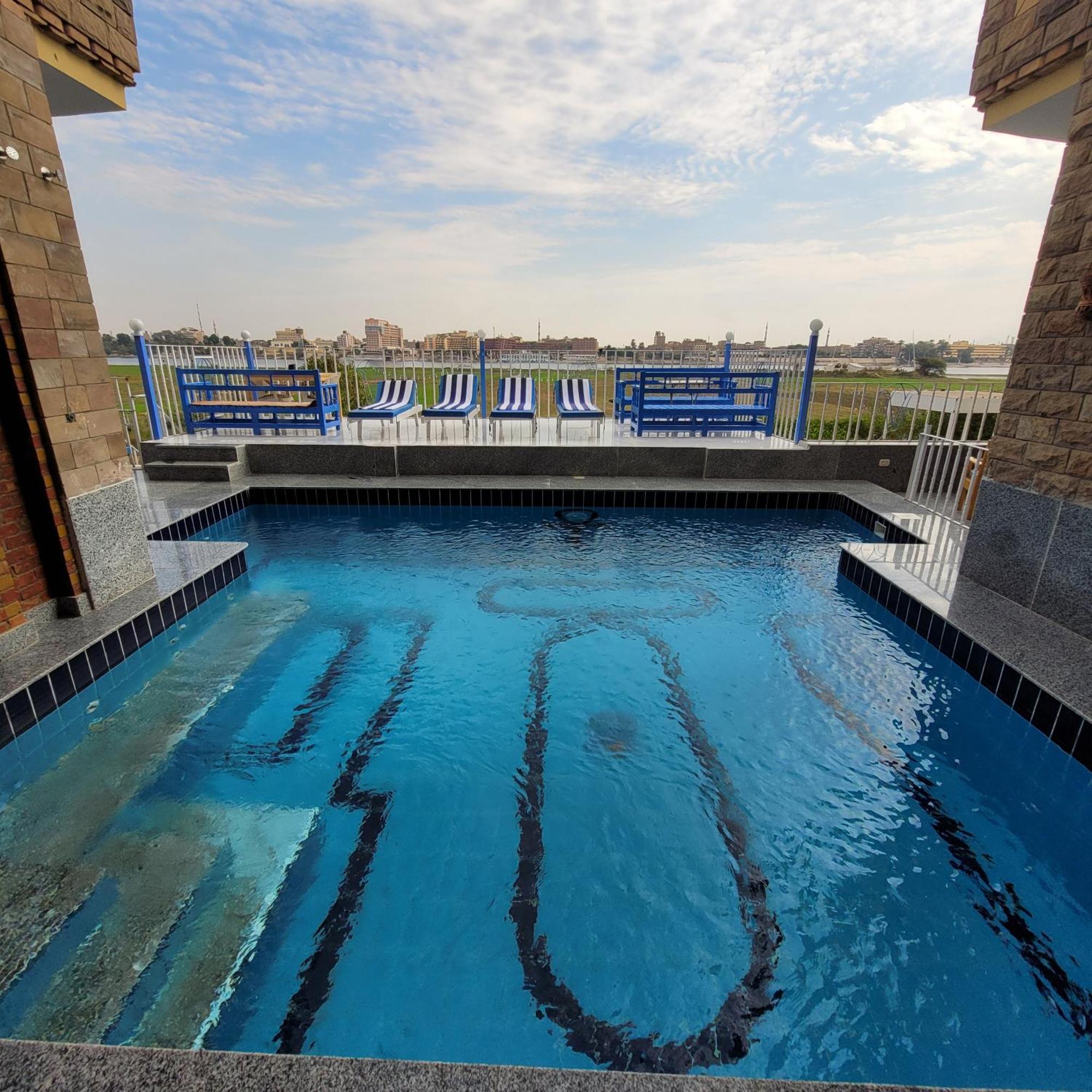 Апартаменты Blue Nile House Луксор Номер фото
