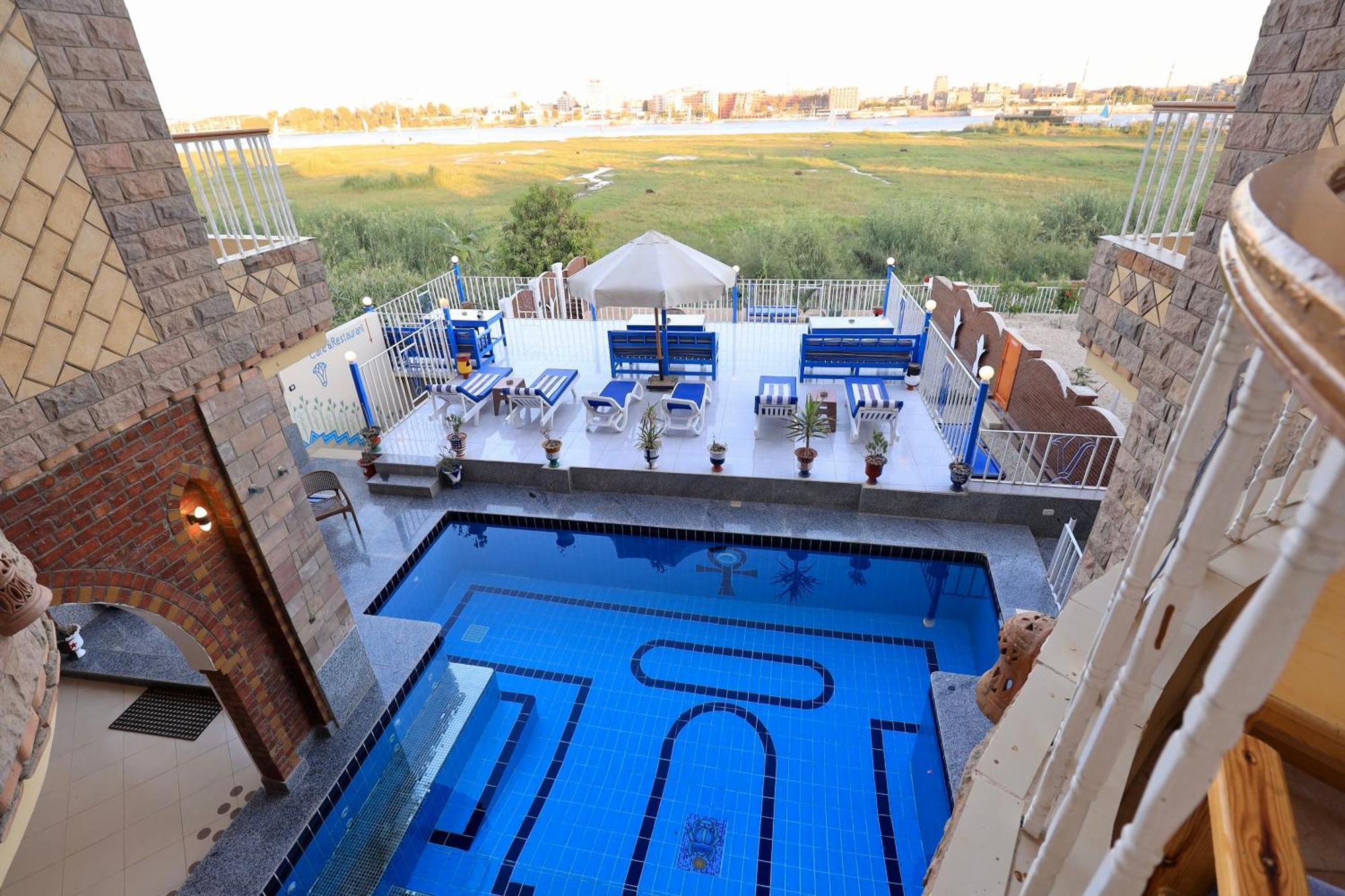 Апартаменты Blue Nile House Луксор Номер фото